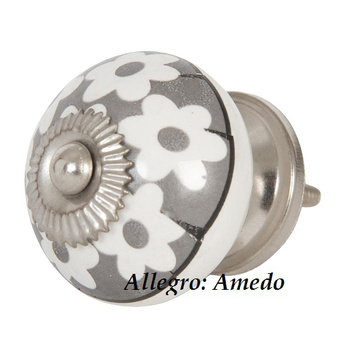 Gałka z szarym kwiatkiem.